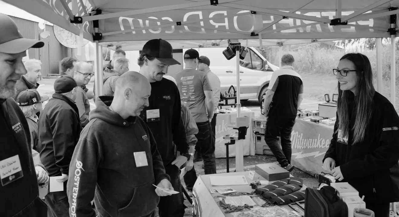 group of people at booth