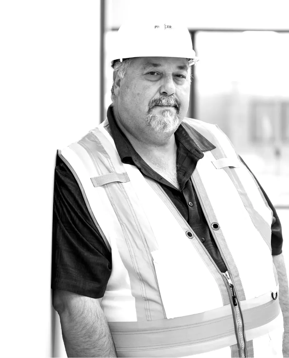 man with hardhat smiling